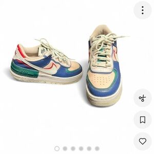 Nike Air Sneakers with Red and Blue Accents